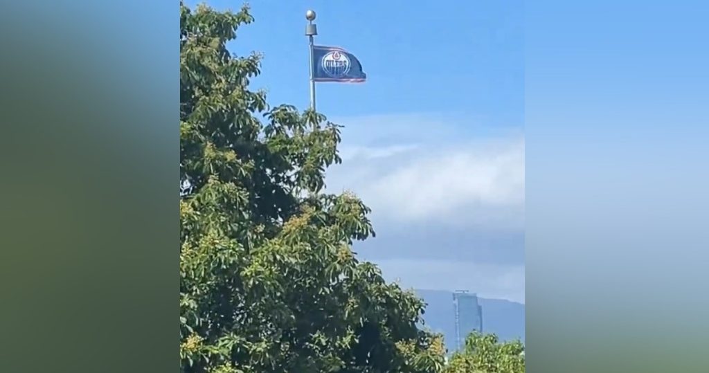 A deal's a deal: Edmonton Oilers flag flying proudly over Vancouver City Hall