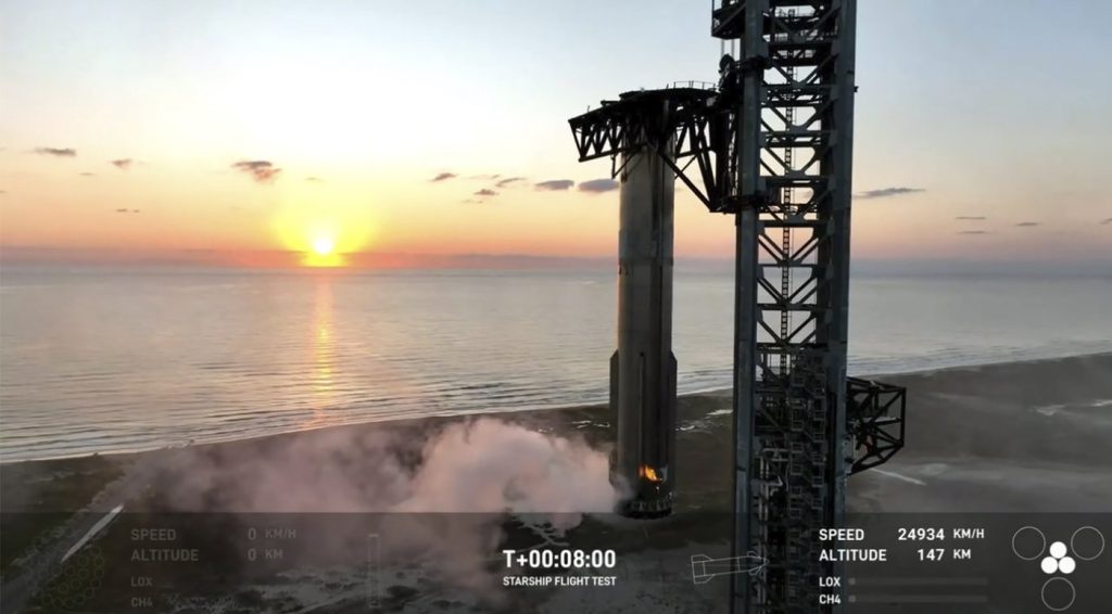 In an engineering feat, mechanical SpaceX arms catch Starship rocket booster back at the launch pad