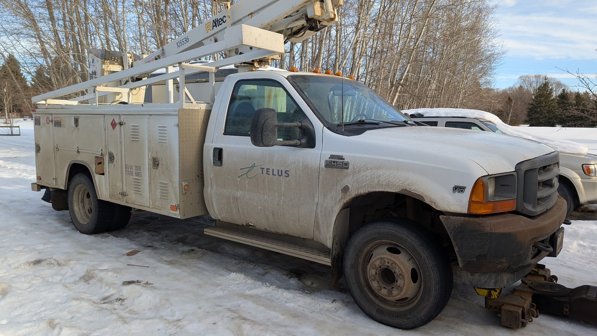 Man charged for allegedly stealing Telus boom lift pickup truck west of ...