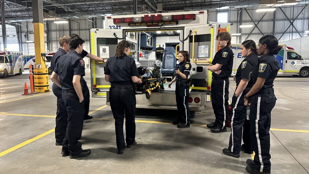Loading stretchers, stitching wounds: Alberta paramedic students get hands-on EMS training