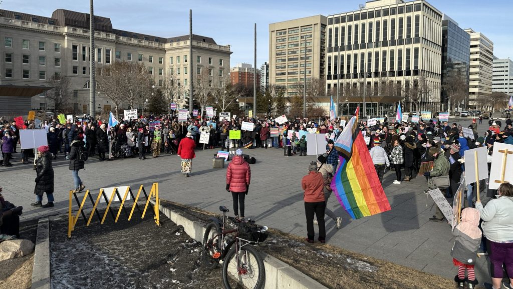 Transgender community gathers in remembrance, opposition to Alberta legislation