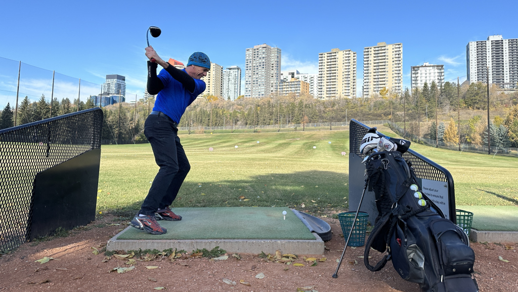 golfer at driving range