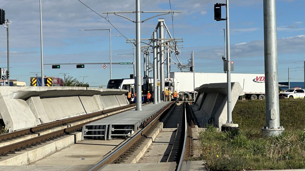 TransEd employee injured after semi-truck allegedly turns right on red, collides with Valley Line LRT