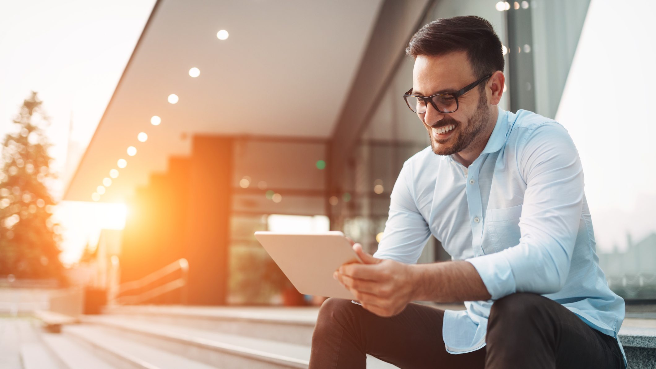 Business man holding tablet