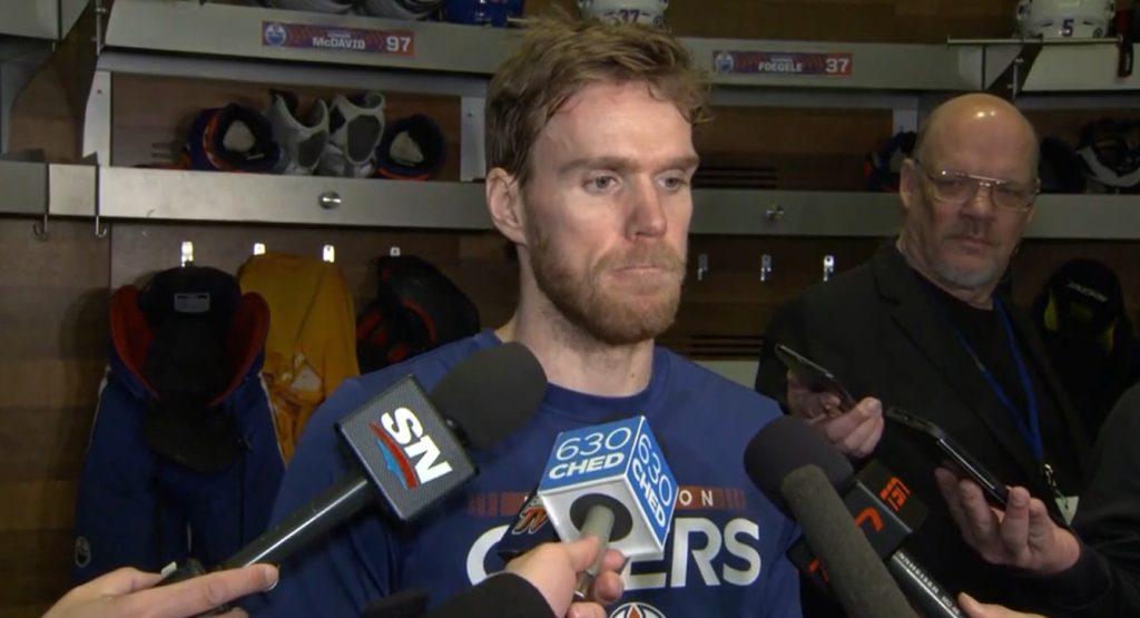Connor McDavid speaking to reporters