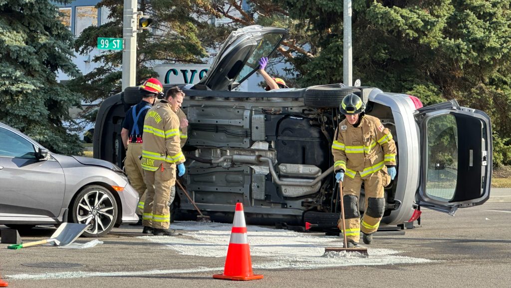 Elderly woman hospitalized after rollover in south Edmonton