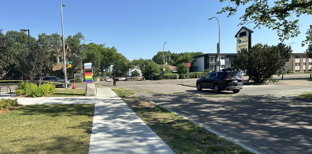 Taped off crime scene on Whyte Avenue near 95A Street